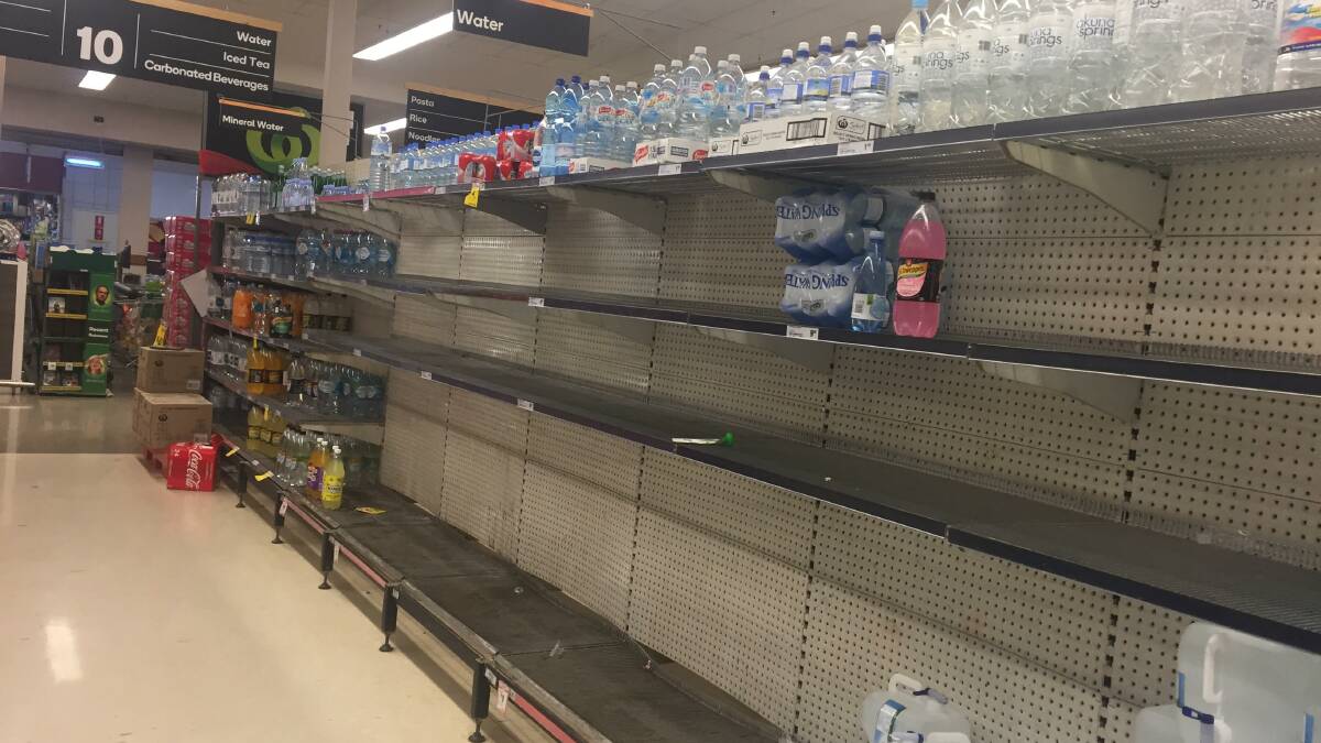TAKING PRECAUTIONS: The scene at Katherine's local supermarket after a run on bottled water.