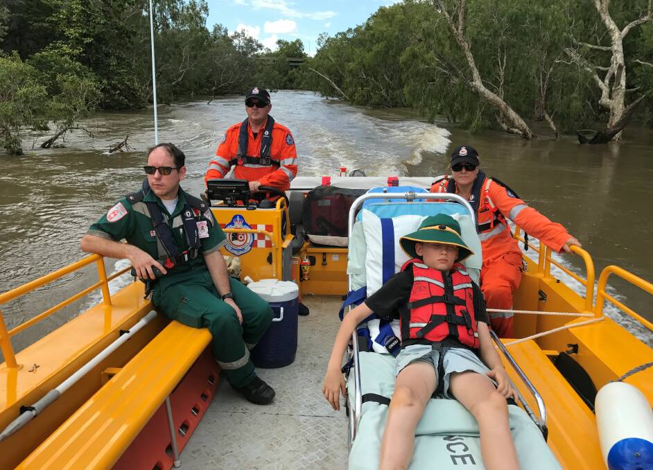 SAVING LIVES: On Sunday, NTES volunteers aboard ESV401 worked alongside a St John Ambulance paramedic to determine the process for safely loading two ambulance stretchers onto the boat and securing them. Picture: supplied.