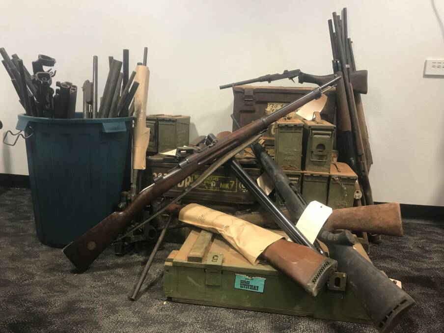 A large number of guns, and gun parts, have been seized by police at Tennant Creek. Picture: NT Police.