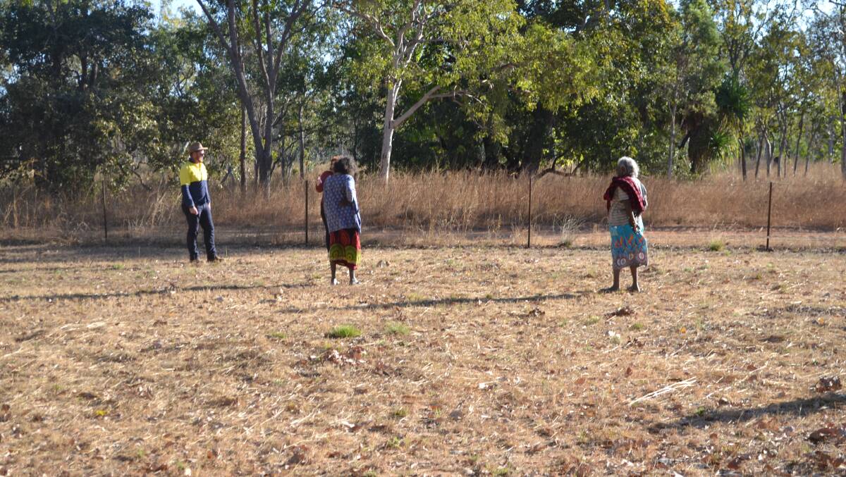 Traditional owners identifying unmarked graves in Barunga last year. Picture: supplied.