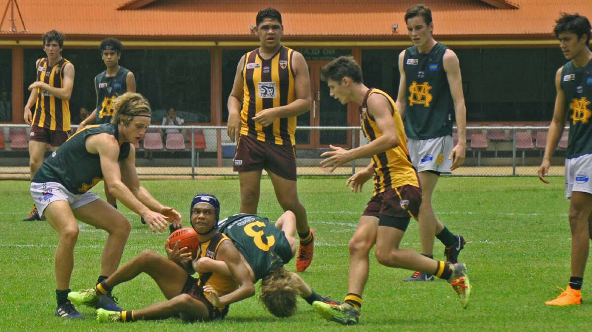 TOUGH SLOG: After seven successive trips to Darwin, the Katherine's region's best young AFL players will play at home.