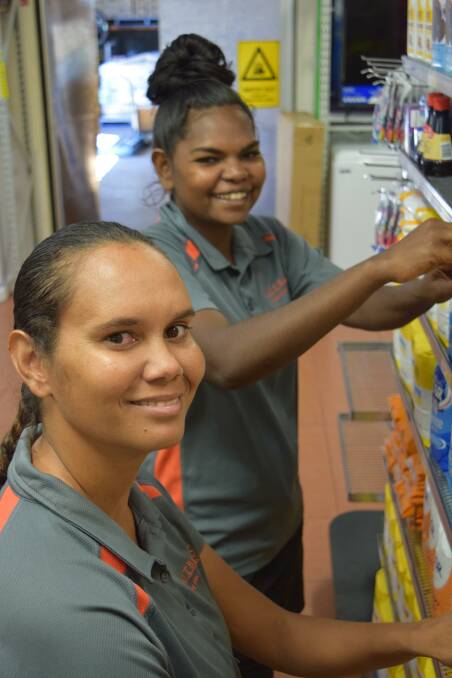 Alma Ngalmi (left) working with Fiona Cooper at the Nauiyu Store. Picture supplied.