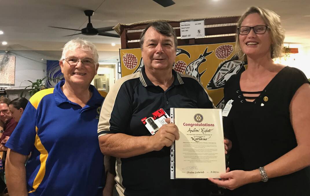 Andrew Highet (centre) is inducted into the Rotary Club. Picture: supplied.