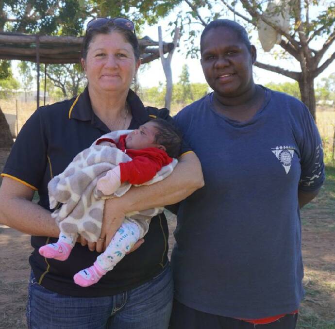 Remote nurse Gianna Douglas with Roberta Forbes at Beswick, with Roberta's newborn baby, also named Gianna. Gianna has been involved with Roberta since the beginning of her antenatal period and believes the MECSH program is helping to create a supportive environment. Picture: supplied.