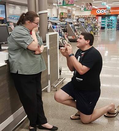 WHAT THE: Shoppers did a double take at Katherine's Woolworths' store on Wednesday night when Katy Jay's beau Chris Gill popped the question. Picture: supplied.