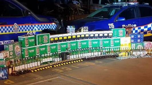 Almost 500 litres of alcohol seized in a combined operation at Katherine in August last year. Pictures: NT Police.