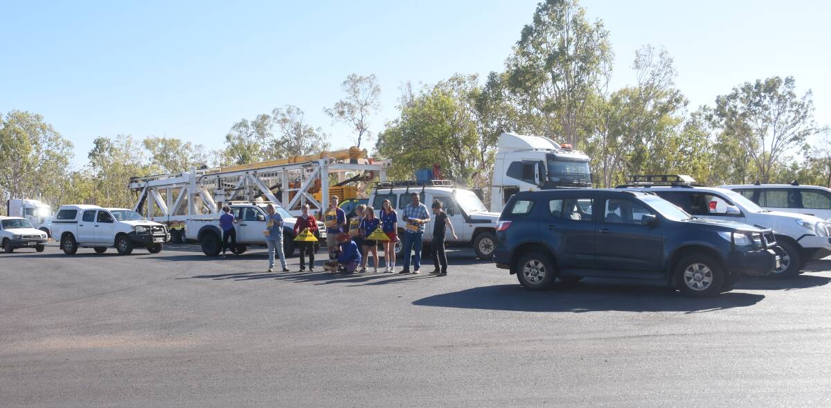 HEMMED IN: Anti-fracking protesters used their vehicles just outside Katherine today to corral a truck they said was involved in exploratory drilling for onshore gas. Picture: Roxanne Fitzgerald.