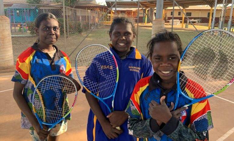 LEARNING TENNIS: Room 15 students Amber-Rose Dhamarrandji, Shianiata Tapau and Leo Wilfred have been enjoying their tennis lessons. Photo: Aimee O'Connor
