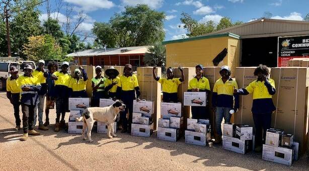 SUPPORT: The delivery of white goods to all 75 homes in the Beswick community. Photo: Supplied