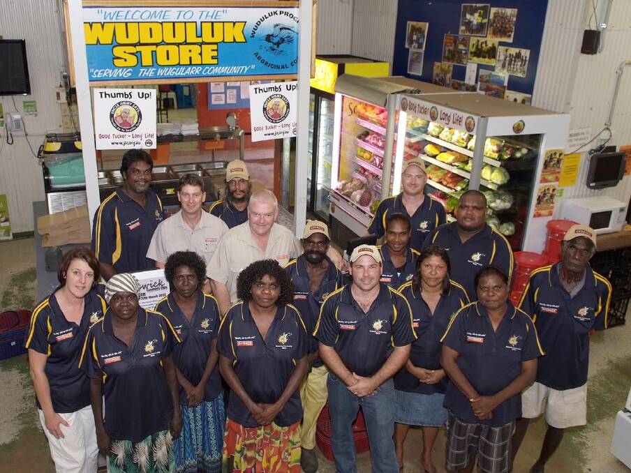 BACK IN THE DAY: Staff members of Katherine and Darwin's community stores pictured in 2012 in the Beswick facility. Photo: Supplied