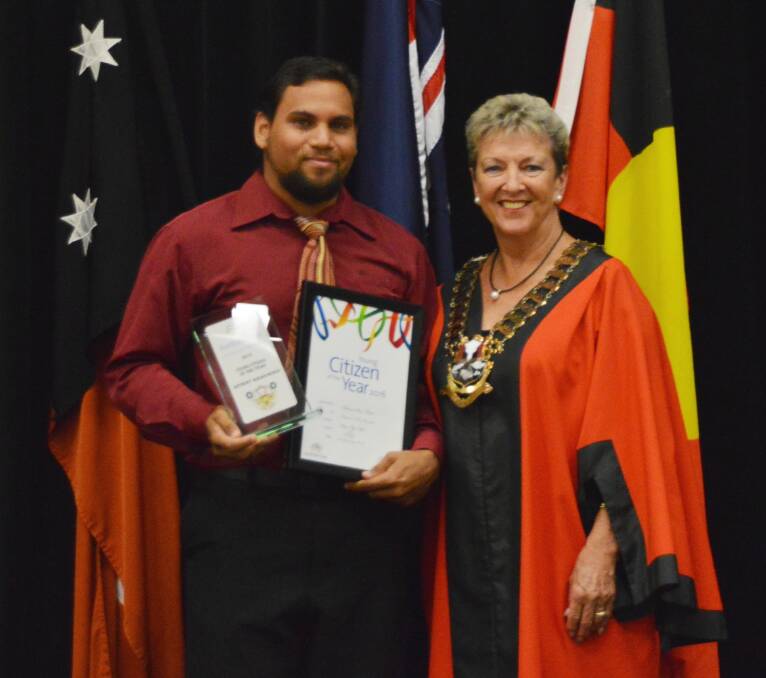 A beaming Young Citizen of the Year, Anthony Assan-Busch, is congratulated by Katherine Town Council mayor Fay Miller.