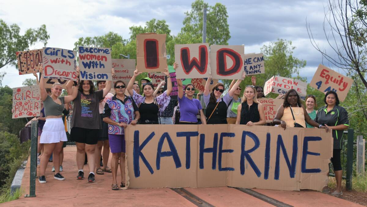 Katherine residents out in force for the first IWD March since 2019. Picture: Tom Robinson. 