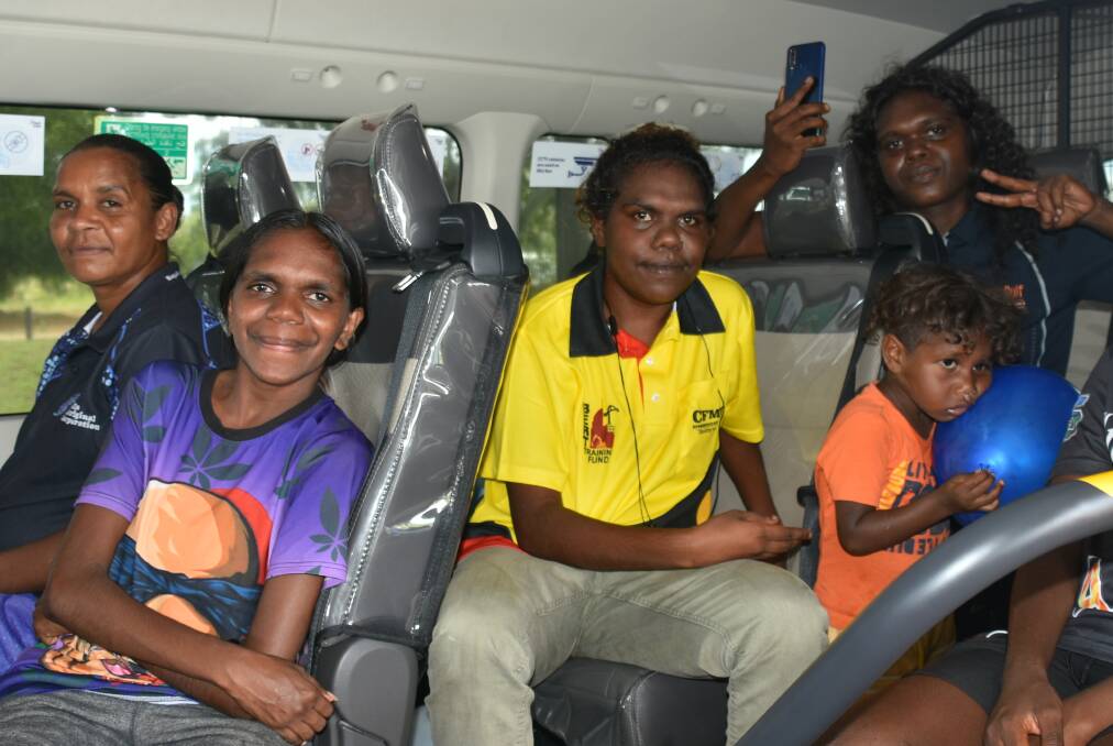 Barunga residents give the new bus a test run. Photo: Tom Robinson. 