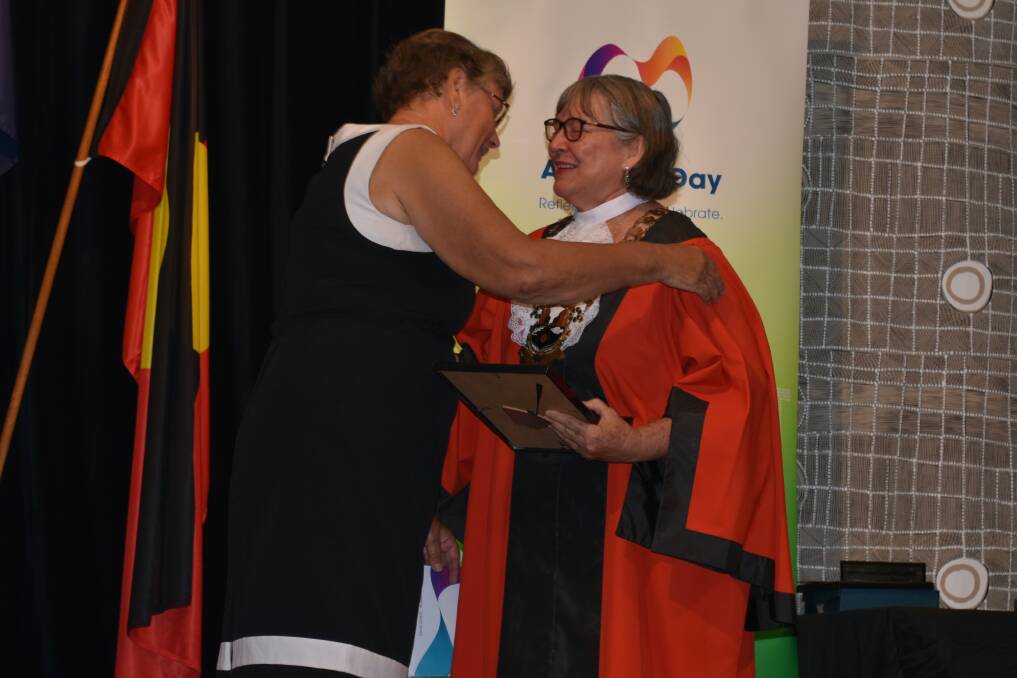 Valerie Smith hugs Lis Clark as she recieves her award. Picture: Tom Robinson. 