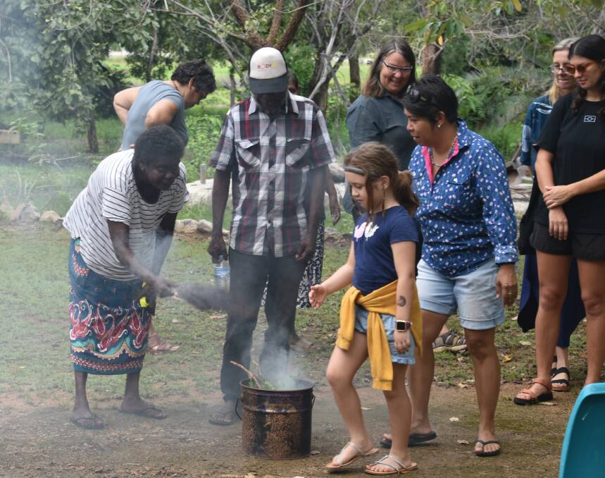 Traditional Owners welcomed people to country with a smoking ceremony. Picture: Tom Robinson. 