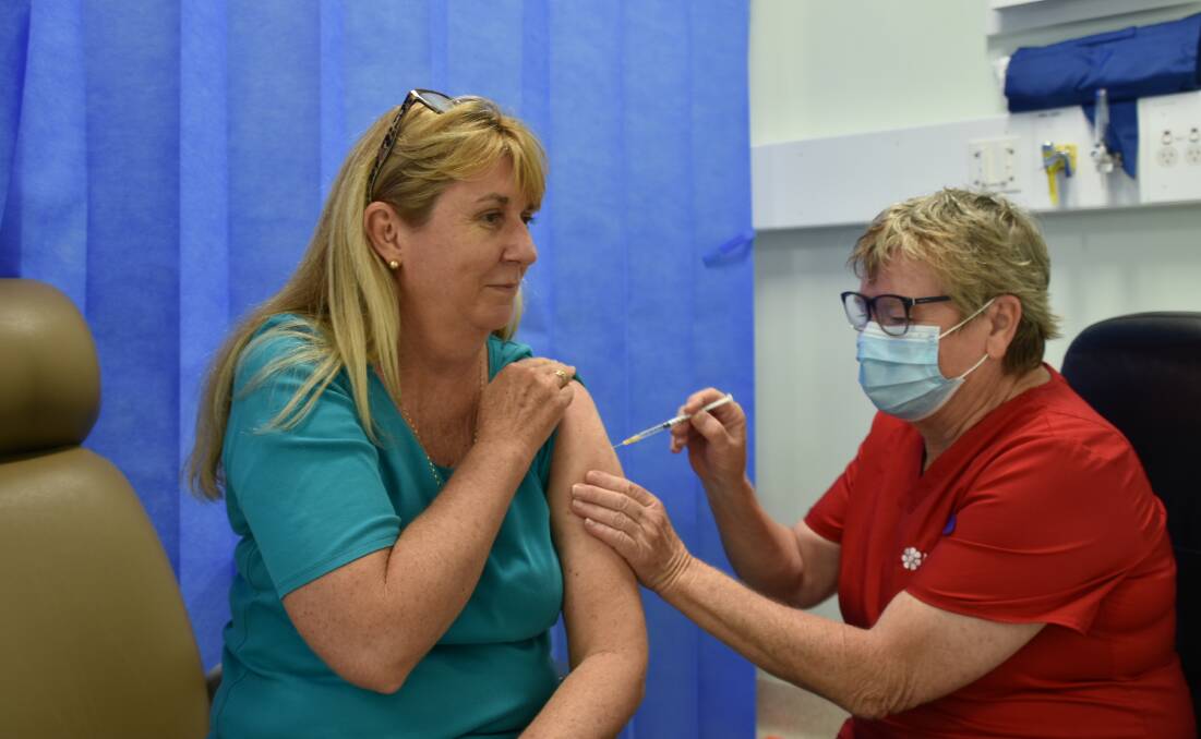 Maria Chandler receives her vaccine. Photo: Tom Robinson. 