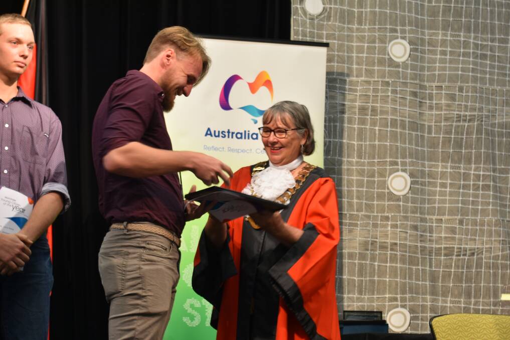 Nathaniel MacKinnon accepts his award from mayor Lis Clark on January 26. Picture: Katherine Times. 