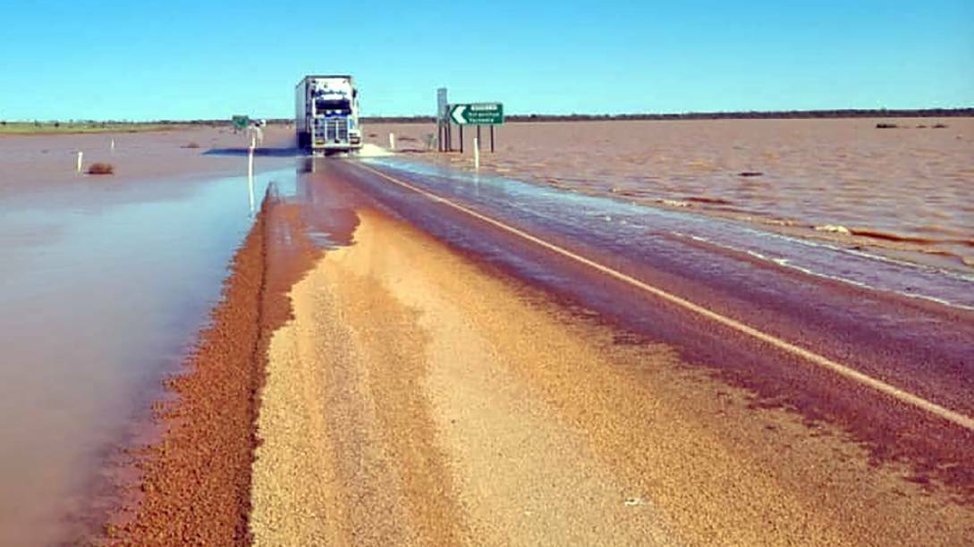 Freight trucks slowly moving one-way only along the flood damaged Stuart Highway to the Northern Territory in January. Picture: SA Infrastructure and Transport.