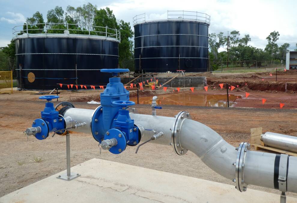 NEW: The bore pump manifold in front of the PFAS plant process and treated water tanks. Photo: Supplied by Power and Water.