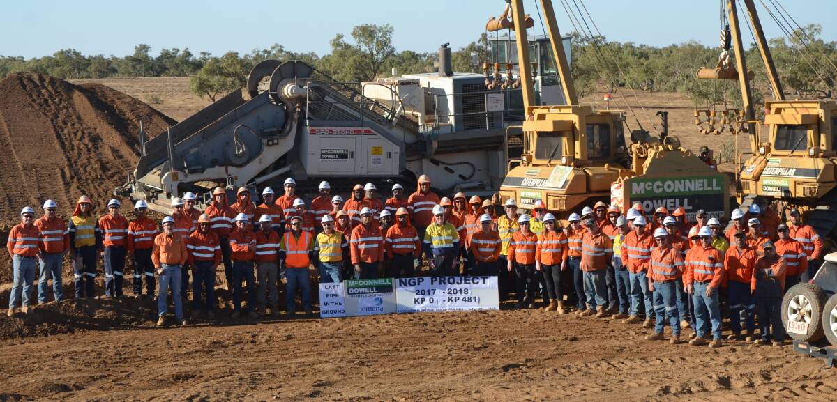 LANDMARK: Jemena staff celebrate the end of the construction of the Tennant Creek - Mount Isa pipeline. Photo: supplied