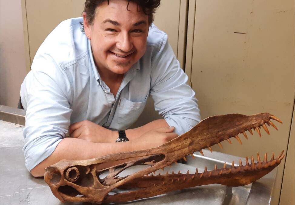 Tim Richards with the newly identified pterosaur.
