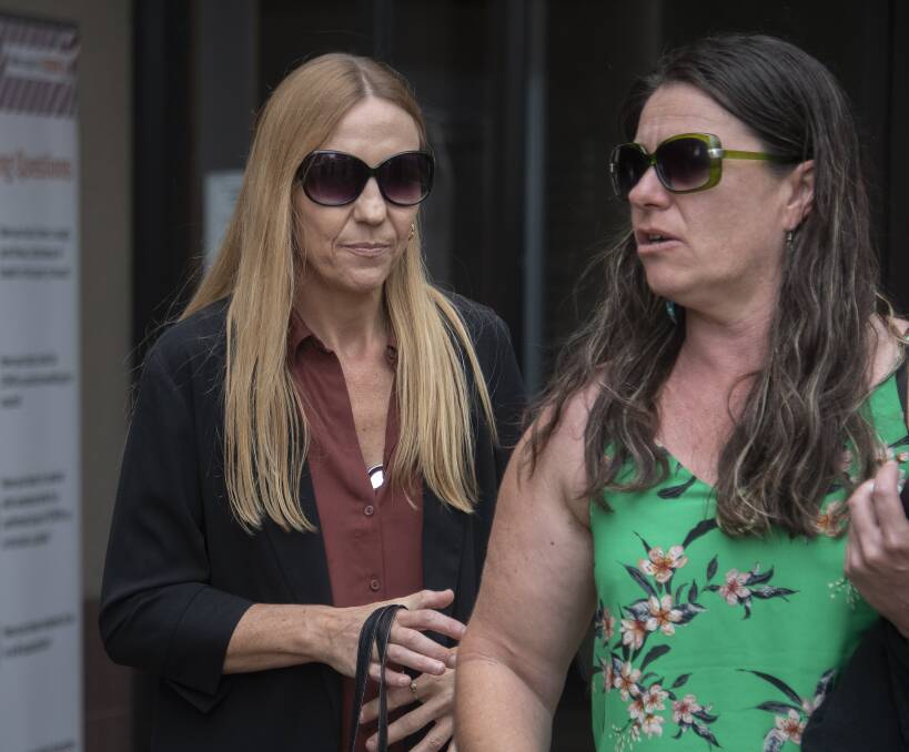 DESPERATE FOR ANSWERS: Jayden Penno-Tompsett's mother, Rachel Penno, left, and her friend outside court in Cairns. Picture: Brian Casey