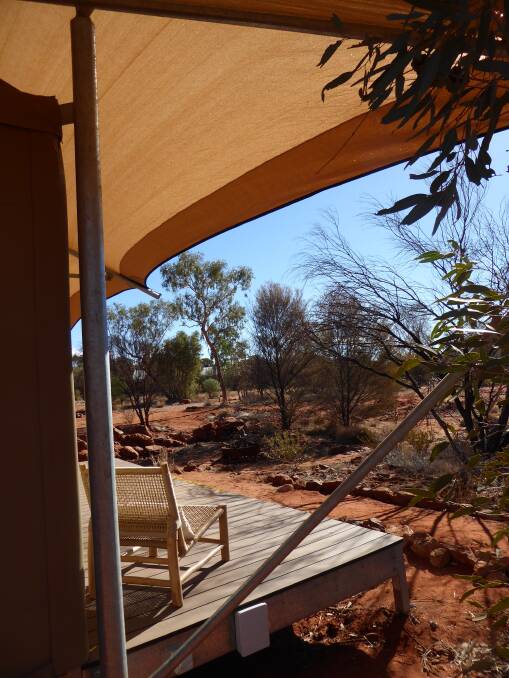 NOT YOUR AVERAGE TENT ... Guests staying in the super-comfy tents at Kings Canyon Resort wake in the morning to the Red Centre at its finest.