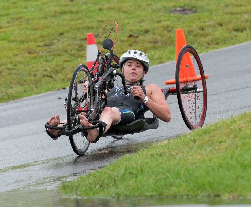 INSPIRATION: Katherine para-triathlete Emily Tapp hard at work during a para-triathlon in Sydney. Emily has since had to return home from Rio de Janeiro. Photo: Keith Hedgeland Photography 