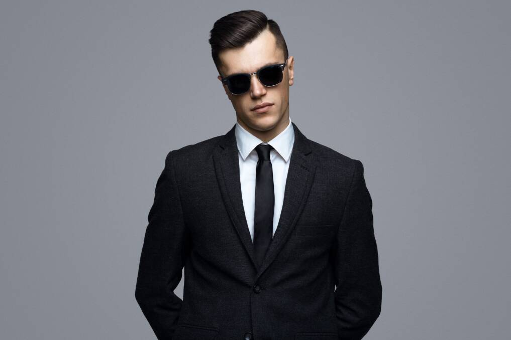 All you need to be part of the Men in Black is a suit and some sunglasses. Picture: Shutterstock