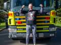 Grant Edwards attempted to pull a 10-tonne fire engine 50 metres to raise awareness for PTSD. Picture: Karleen Minney