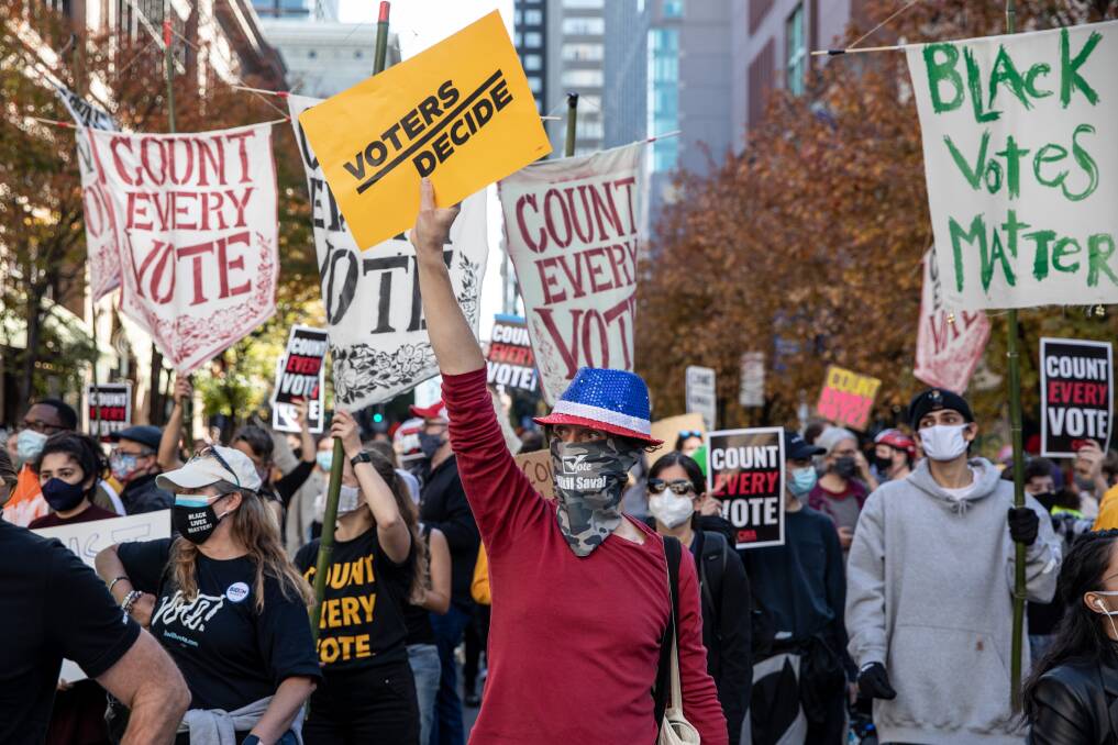 People participate in a protest in support of counting all votes as the election in Pennsylvania is still remains too close to call on November 5, 2020 in Philadelphia, Pennsylvania. Picture: Chris McGrath/Getty Images