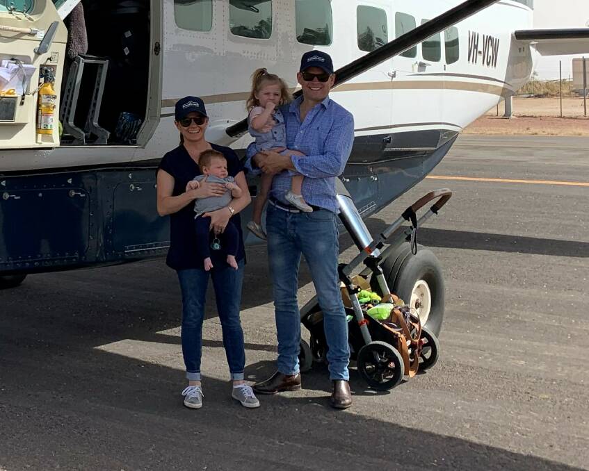 FAMILY: Courtney and Talia Ellis with Sierra, 2, and Jonty, two months, in Birdsville. Their older children Harry, 11, Sophie, 14, and Alexandra, 16, also often make the trip.