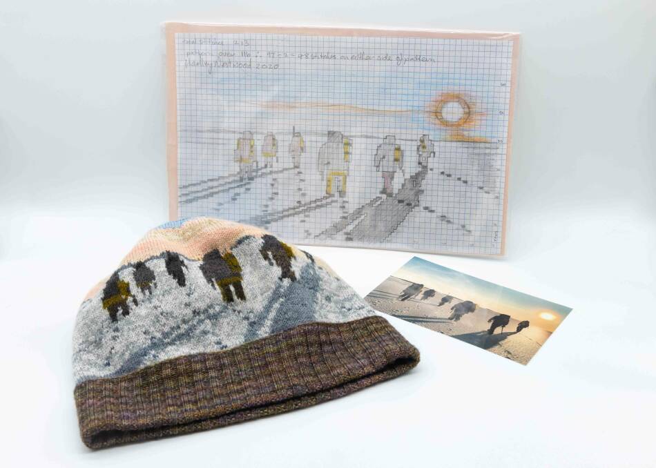 The beanie Hadley created to be auctioned, with the photograph that inspired it, and the graph she created to knit the design. Photo: Dan Broun/Australian Antarctic Division