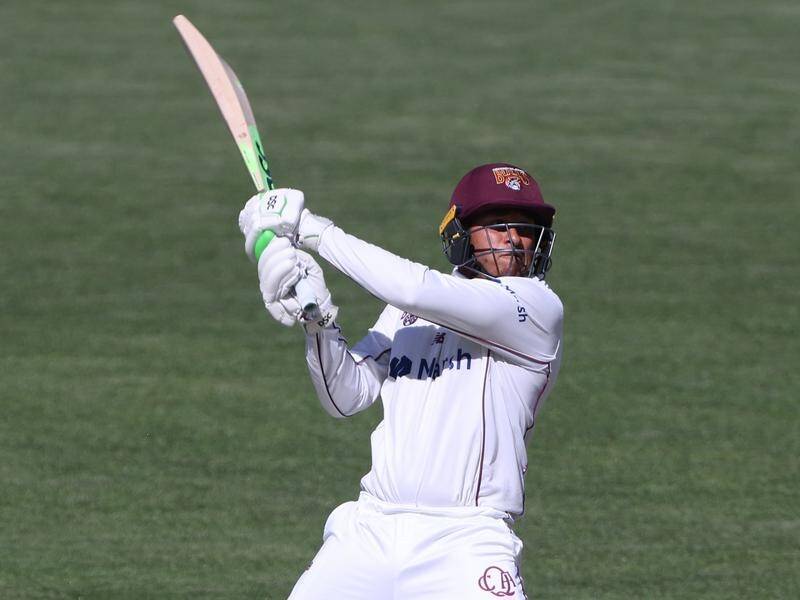 Usman Khawaja has boosted his strong Test recall claims with another shield century for Queensland.