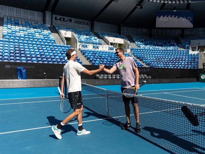 Alexander Zverev and retired basketball great Dirk Nowitzki got together at Melbourne Park. (Diego Fedele/AAP PHOTOS)