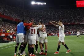 Sevilla celebrate after taking the lead against Mallorca. (EPA PHOTO)