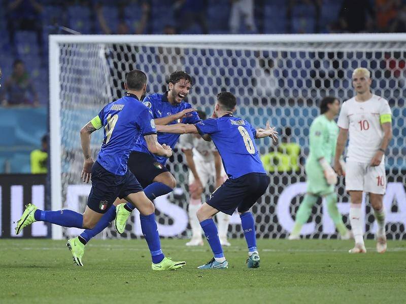 Manuel Locatelli celebrates one of his two goals in Italy's Euro 2020 win over Switzerland.