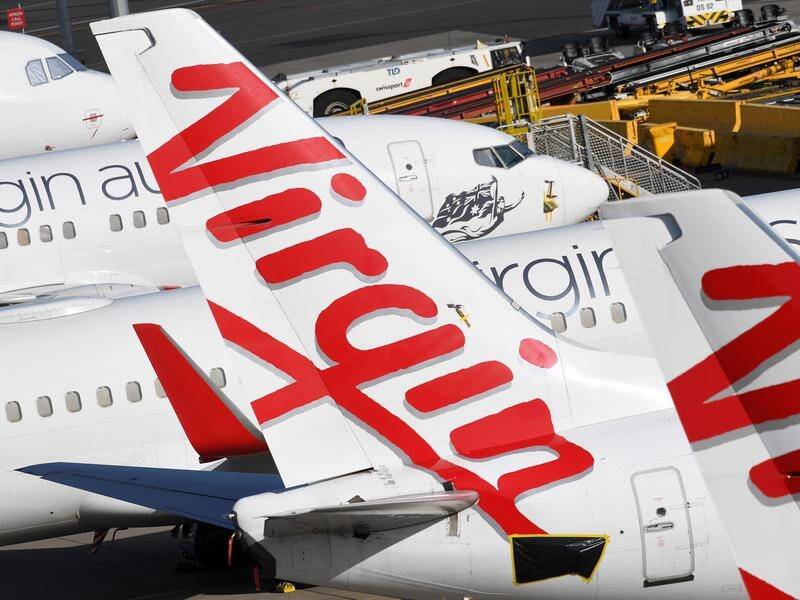 A Virgin Australia flight attendant suffered a broken leg when a high-speed descent went wrong.