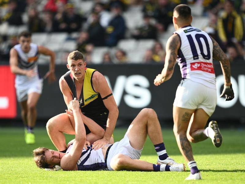 Justin Longmuir called this tackle from Ben Miller another example of Jye Amiss's rough treatment. (Joel Carrett/AAP PHOTOS)