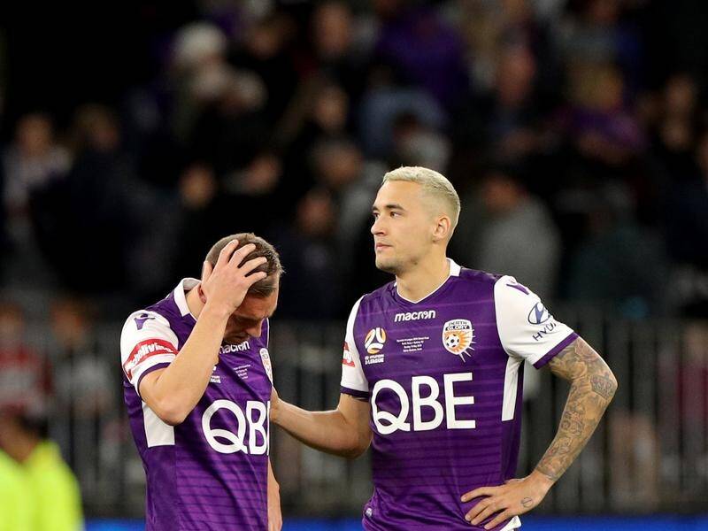 Glory's Brendon Santalab (left)is consoled by Jason Davidson after losing the A-League grand final.