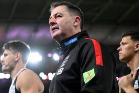 St Kilda coach Ross Lyon has taken a swipe at the AFL's rules covering runners delivering messages. (Joel Carrett/AAP PHOTOS)