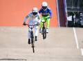 Three-time Olympian Lauren Reynolds (l) trains ahead of the UCI BMX World Cup races in Brisbane. (Jono Searle/AAP PHOTOS)