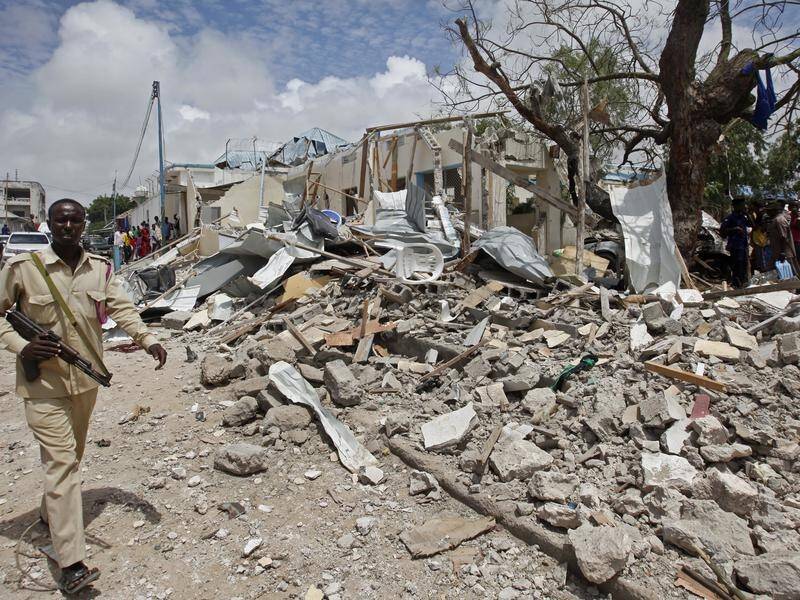 Six people are dead after a bomber detonated at the gate of a district headquarters in Mogadishu.