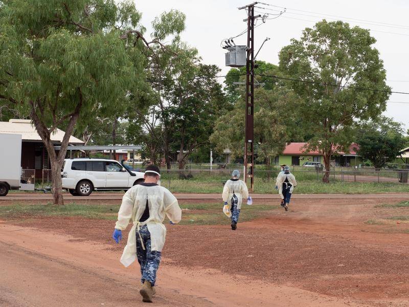 Indigenous groups are calling for federal help as COVID-19 reaches more remote NT communities.