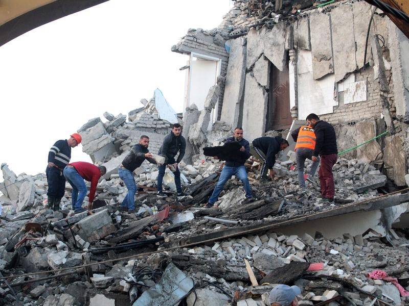 Rescuers are digging through collapsed buildings for survivors after a strong quake hit Albania.