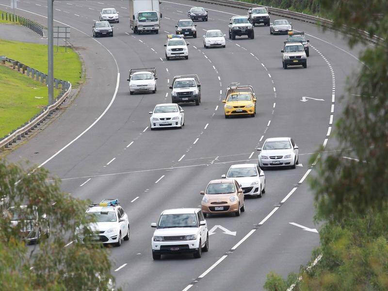 The PM has promised to fix roads under a $2.2 billion plan to keep "Australians safe."