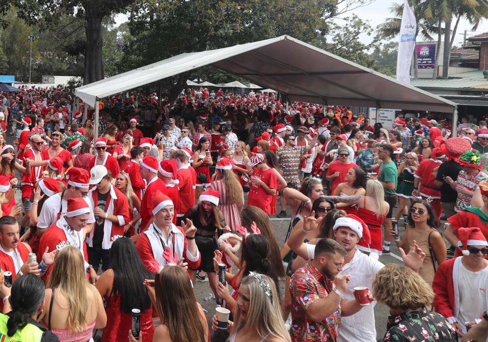What a difference a year makes: The large crowds seen in 2019 won't be a feature of the 2020 Santa Fest which will largely involve participants sharing their festive fundraising celebrations online. Picture: Robert Peet.