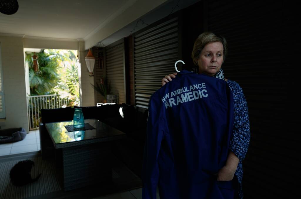 Sharon Jenkins with her late husband's paramedic uniform. File picture
