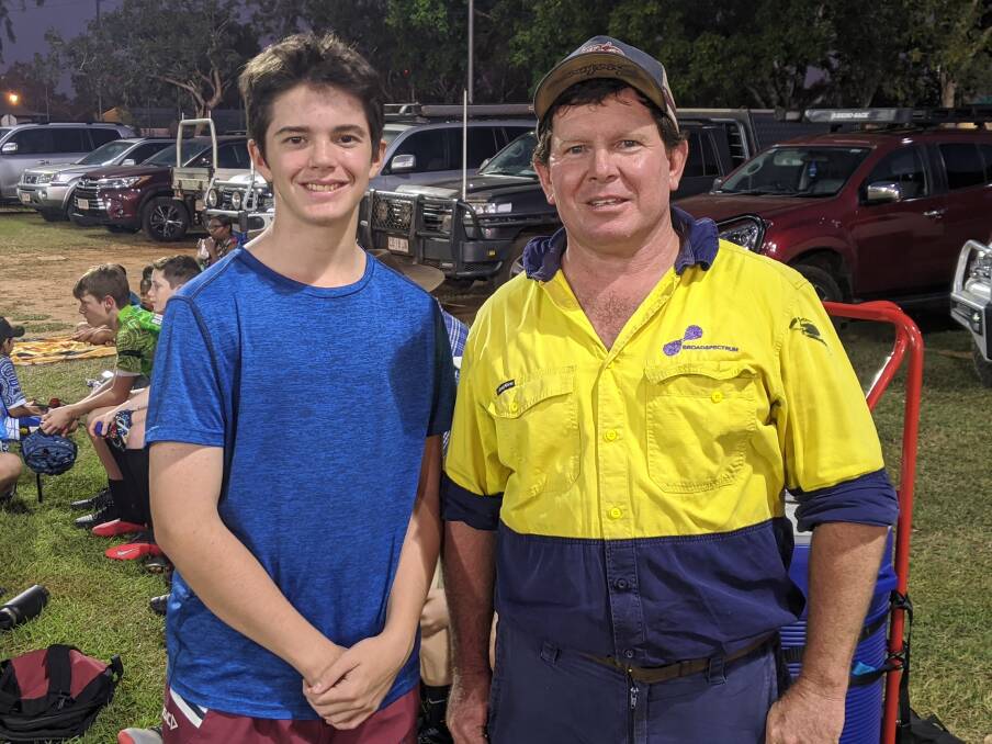 Parent and coach Jim Kelly with his son Josh, who went up to Darwin as part of the U/14's side over the weekend.