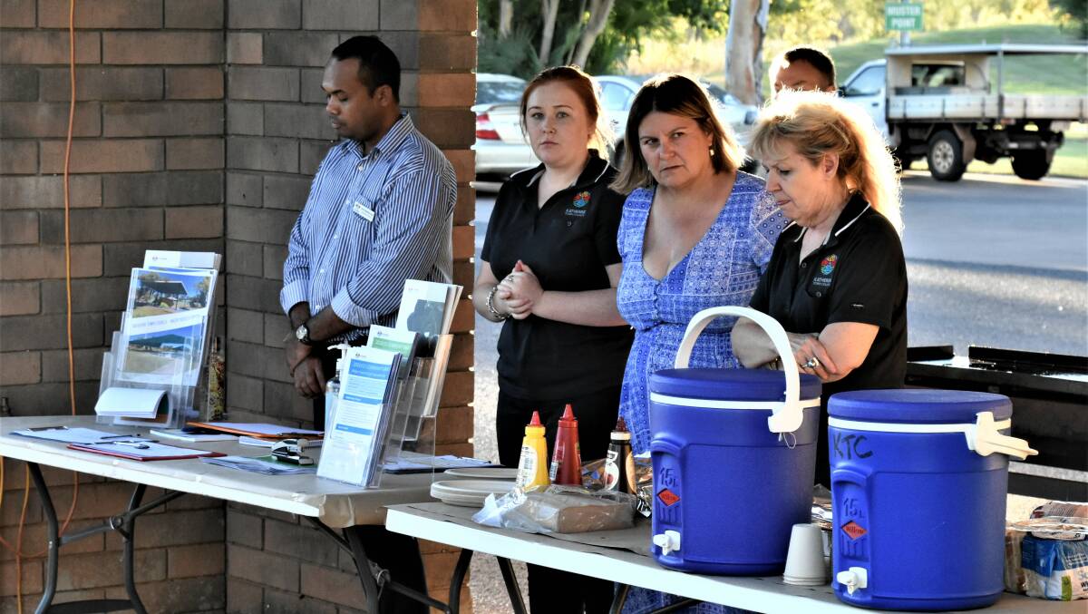 Town council staff were put to work on the BBQ handing out sausage and drinks.